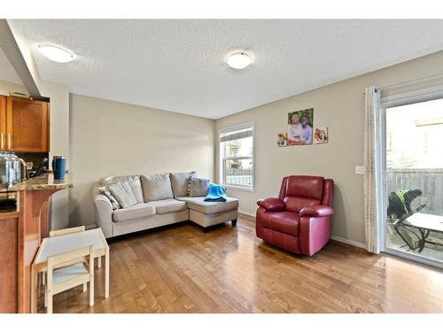 82 Panatella Villas Nw, Calgary, AB - Indoor Photo Showing Living Room