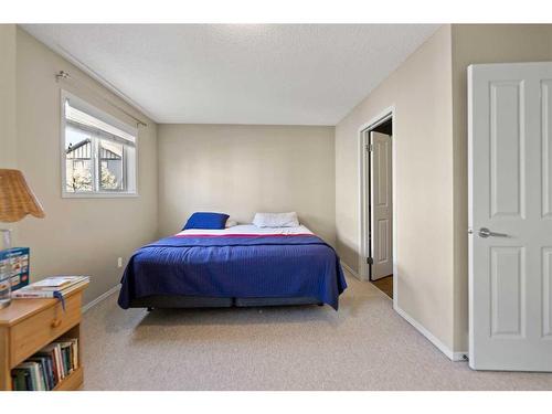 82 Panatella Villas Nw, Calgary, AB - Indoor Photo Showing Bedroom