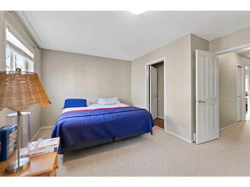 82 Panatella Villas Nw, Calgary, AB - Indoor Photo Showing Bedroom