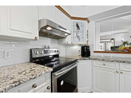 44 Sierra Nevada Rise Sw, Calgary, AB - Indoor Photo Showing Kitchen With Upgraded Kitchen