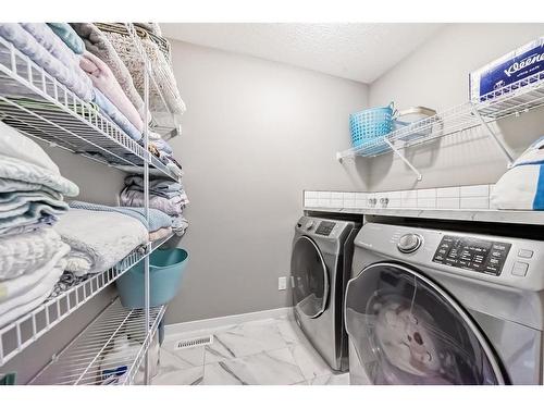 61 Sage Bluff Rise Nw, Calgary, AB - Indoor Photo Showing Laundry Room