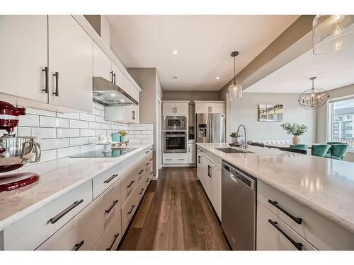 61 Sage Bluff Rise Nw, Calgary, AB - Indoor Photo Showing Kitchen With Upgraded Kitchen