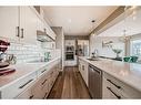 61 Sage Bluff Rise Nw, Calgary, AB  - Indoor Photo Showing Kitchen With Upgraded Kitchen 