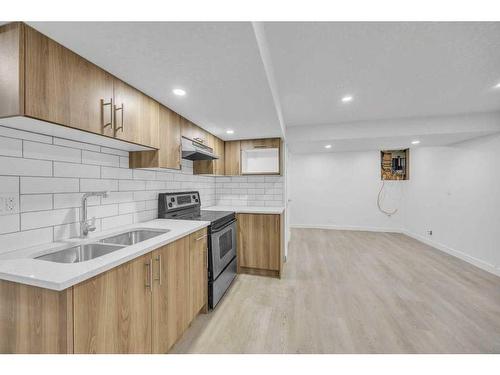 5915 Rundlehorn Drive Ne, Calgary, AB - Indoor Photo Showing Kitchen With Double Sink With Upgraded Kitchen