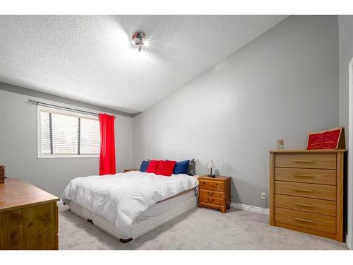 22 Mt Douglas Villas Se, Calgary, AB - Indoor Photo Showing Bedroom