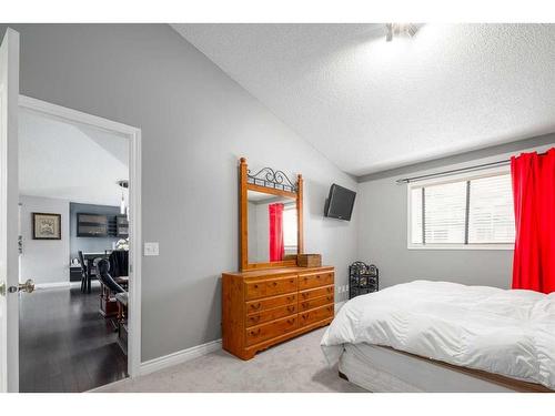 22 Mt Douglas Villas Se, Calgary, AB - Indoor Photo Showing Bedroom