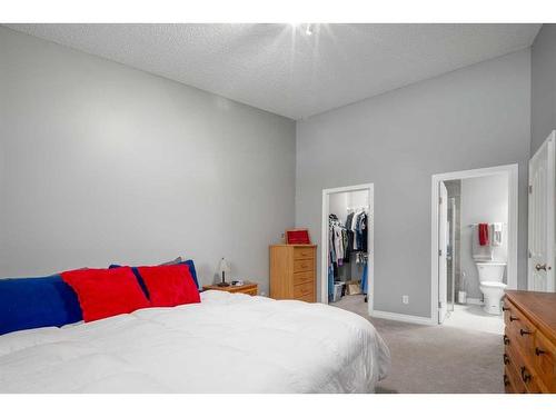 22 Mt Douglas Villas Se, Calgary, AB - Indoor Photo Showing Bedroom