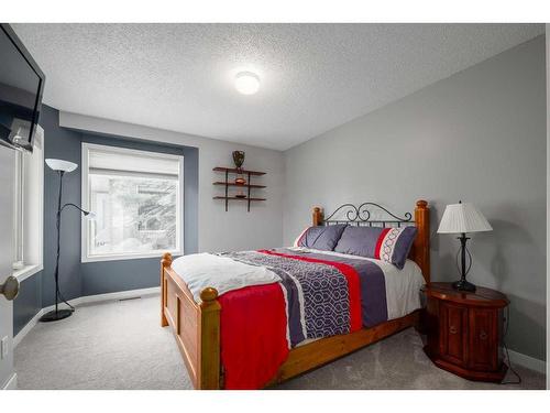 22 Mt Douglas Villas Se, Calgary, AB - Indoor Photo Showing Bedroom