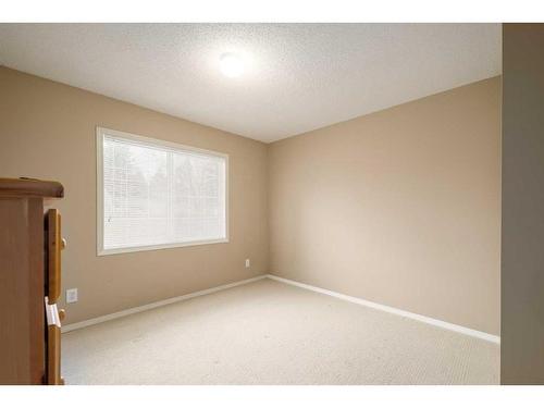 22 Mt Douglas Villas Se, Calgary, AB - Indoor Photo Showing Other Room