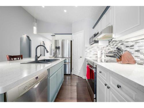 22 Mt Douglas Villas Se, Calgary, AB - Indoor Photo Showing Kitchen With Double Sink With Upgraded Kitchen