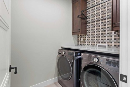 137 Silvertip Ridge, Canmore, AB - Indoor Photo Showing Laundry Room