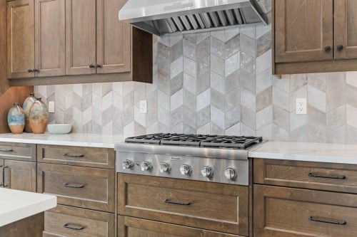 137 Silvertip Ridge, Canmore, AB - Indoor Photo Showing Kitchen With Upgraded Kitchen