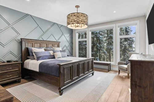 137 Silvertip Ridge, Canmore, AB - Indoor Photo Showing Bedroom
