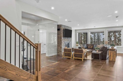137 Silvertip Ridge, Canmore, AB - Indoor With Fireplace