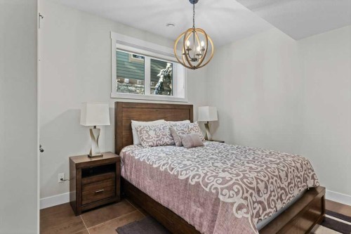 137 Silvertip Ridge, Canmore, AB - Indoor Photo Showing Bedroom