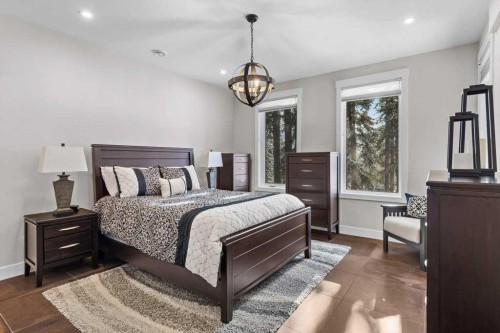137 Silvertip Ridge, Canmore, AB - Indoor Photo Showing Bedroom