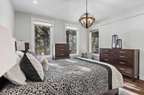 137 Silvertip Ridge, Canmore, AB - Indoor Photo Showing Bedroom