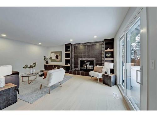 92 Deermeade Road Se, Calgary, AB - Indoor With Fireplace