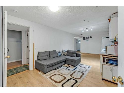 212 Coral Springs Circle Ne, Calgary, AB - Indoor Photo Showing Living Room