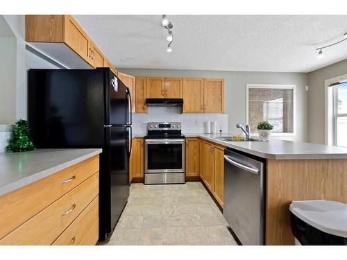 30 Panatella Street Nw, Calgary, AB - Indoor Photo Showing Kitchen