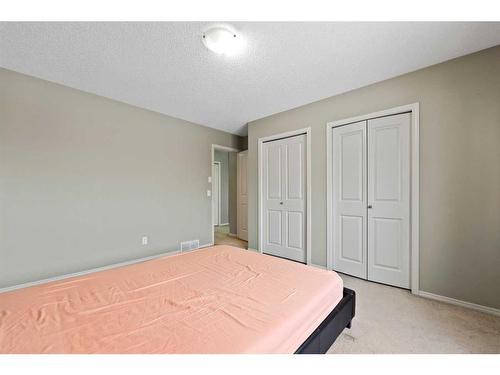 30 Panatella Street Nw, Calgary, AB - Indoor Photo Showing Bedroom