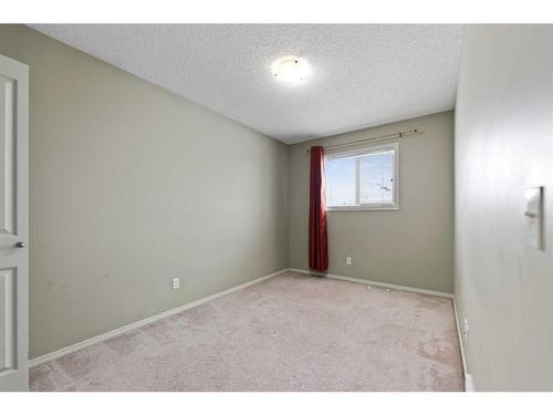 30 Panatella Street Nw, Calgary, AB - Indoor Photo Showing Other Room