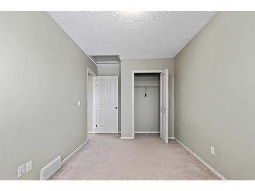 30 Panatella Street Nw, Calgary, AB - Indoor Photo Showing Other Room