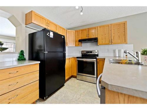 30 Panatella Street Nw, Calgary, AB - Indoor Photo Showing Kitchen