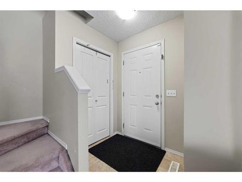 30 Panatella Street Nw, Calgary, AB - Indoor Photo Showing Living Room