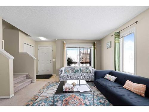 30 Panatella Street Nw, Calgary, AB - Indoor Photo Showing Living Room