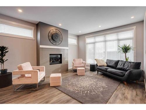 8105 47 Avenue Nw, Calgary, AB - Indoor Photo Showing Living Room With Fireplace