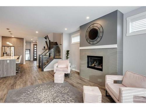 8105 47 Avenue Nw, Calgary, AB - Indoor Photo Showing Living Room With Fireplace