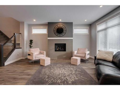 8105 47 Avenue Nw, Calgary, AB - Indoor Photo Showing Living Room With Fireplace