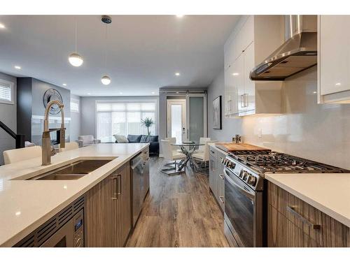 8105 47 Avenue Nw, Calgary, AB - Indoor Photo Showing Kitchen With Double Sink With Upgraded Kitchen