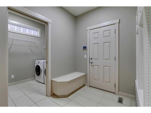 15 Aspen Stone Way Sw, Calgary, AB - Indoor Photo Showing Laundry Room