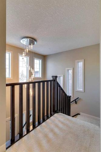 15 Aspen Stone Way Sw, Calgary, AB - Indoor Photo Showing Other Room