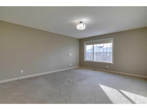 15 Aspen Stone Way Sw, Calgary, AB - Indoor Photo Showing Other Room