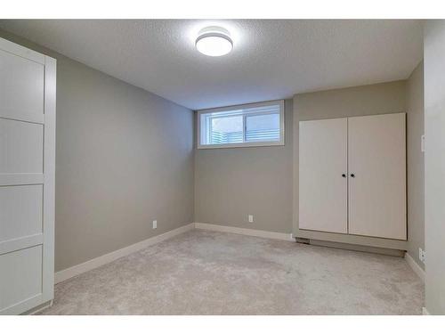 15 Aspen Stone Way Sw, Calgary, AB - Indoor Photo Showing Other Room