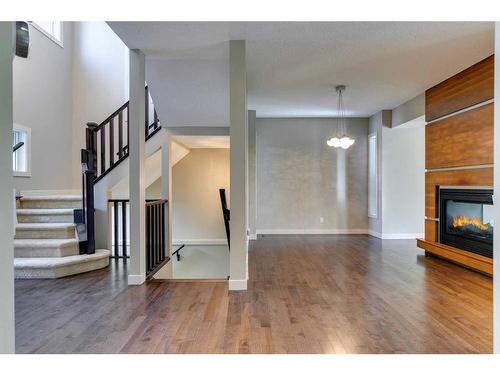 15 Aspen Stone Way Sw, Calgary, AB - Indoor With Fireplace