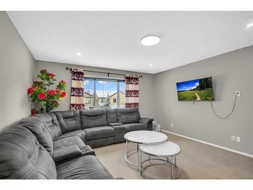 137 Saddlecrest Green Ne, Calgary, AB - Indoor Photo Showing Living Room