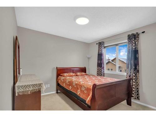 137 Saddlecrest Green Ne, Calgary, AB - Indoor Photo Showing Bedroom