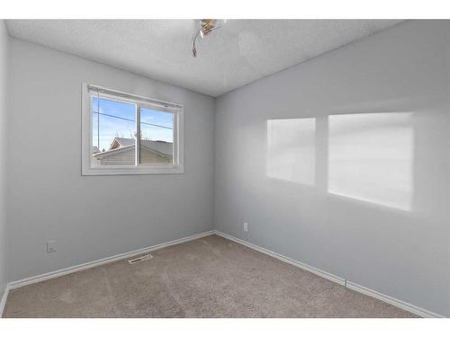 204 Olympia Drive Se, Calgary, AB - Indoor Photo Showing Other Room