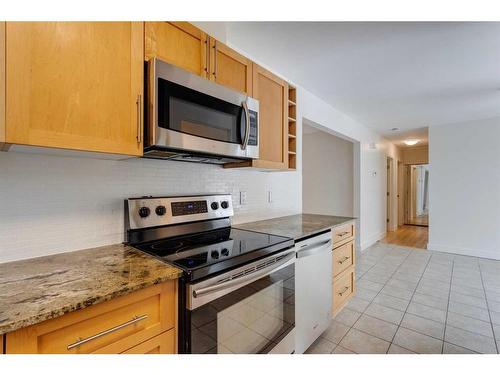 68 Haddock Road Sw, Calgary, AB - Indoor Photo Showing Kitchen With Stainless Steel Kitchen