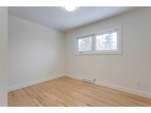 68 Haddock Road Sw, Calgary, AB - Indoor Photo Showing Other Room