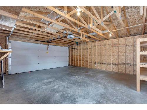 68 Haddock Road Sw, Calgary, AB - Indoor Photo Showing Garage