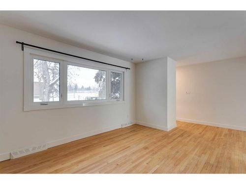 68 Haddock Road Sw, Calgary, AB - Indoor Photo Showing Other Room