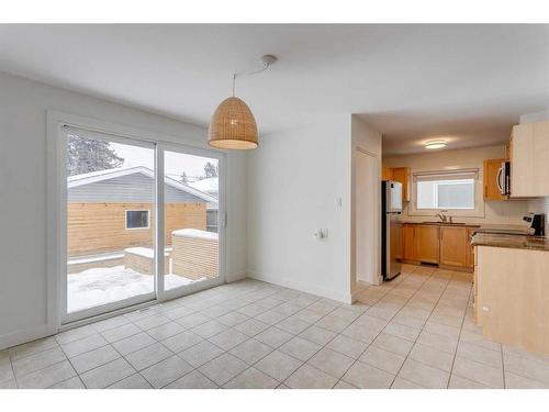 68 Haddock Road Sw, Calgary, AB - Indoor Photo Showing Kitchen