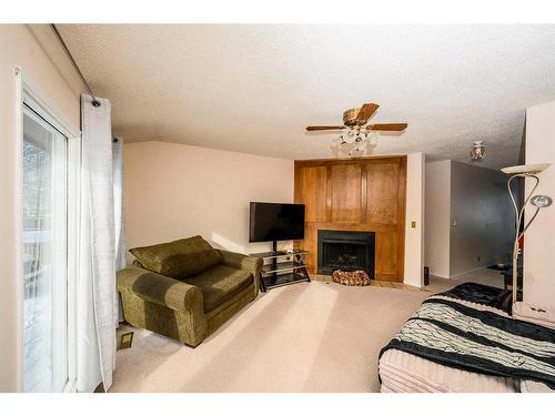 108 Berwick Way Nw, Calgary, AB - Indoor With Fireplace