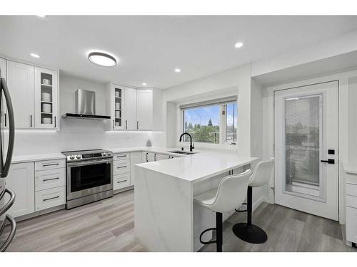 155 Scurfield Place Nw, Calgary, AB - Indoor Photo Showing Kitchen With Upgraded Kitchen