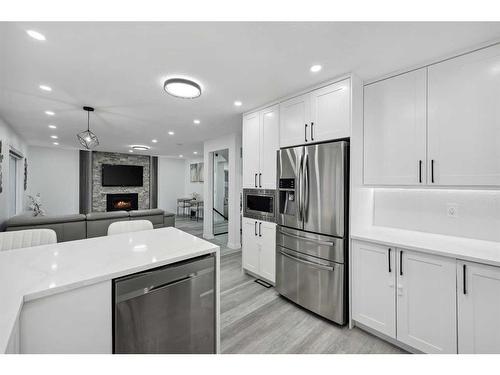 155 Scurfield Place Nw, Calgary, AB - Indoor Photo Showing Kitchen With Upgraded Kitchen